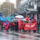 Workers march in the rain down Crown Street for the 2024 May Day March. Picture by Adam McLean