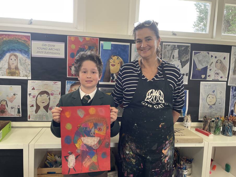 Isaac with his teacher Jacqui Bolt. Picture by Briannah Devlin