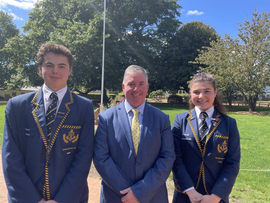 Oxley College captains John Smedley (left) and Leah Halstead (right) helped officially welcome new head of College Scott Bedingfield (middle) to the collage in an assembly. Picture by Briannah Devlin. 