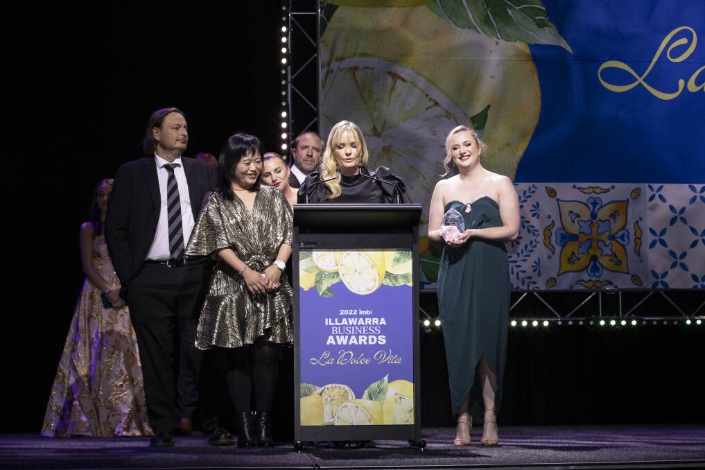 PepperGreen Estate's head chef Mark Chance, owner Katrina Liao, venue manager Katrina Brazenor, vineyard and olive grove manager Ben Brazenor, brand ambassador Jewel Brown and supervisor Heather Buck at the IMB Bank Illawarra Business Awards, accepting the Excellence in Tourism and Hospitality award. Picture by Balanced Image Studios. 
