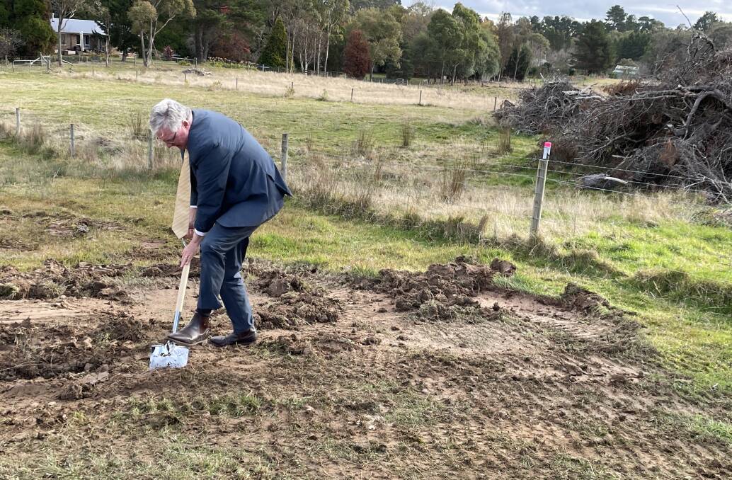 Chevalier College principal Greg Miller turned the soil of the first part of the project. Picture by Briannah Devlin