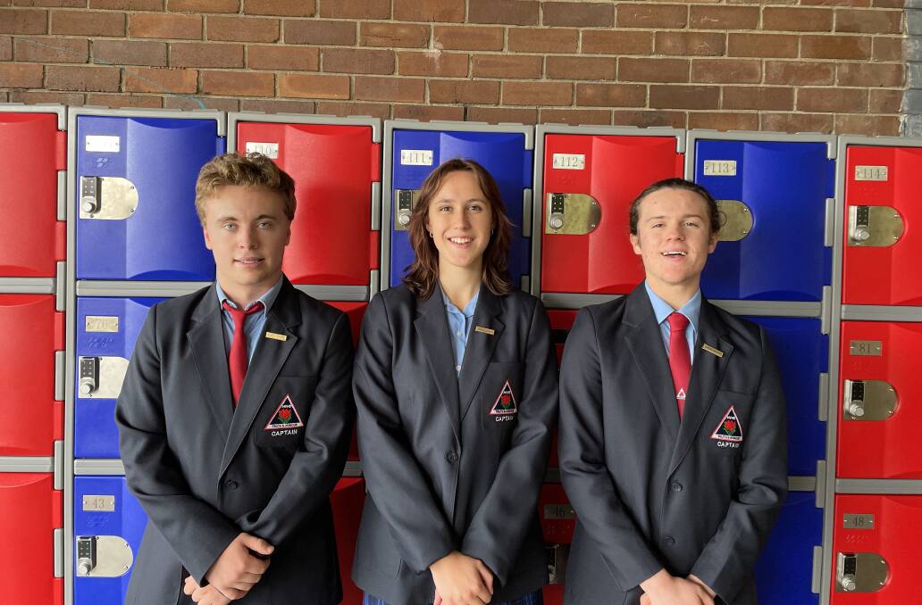 Captains James Denman, Alyssa McCrow and Samuel Kennedy in front of the lockers. Picture by Briannah Devlin. 