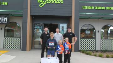 El Jannah Tahmoor employees Lyder Kingbeer, Luke Loprete and Alessandro Loprete with Edward, Hugh and Douglas Hallowell when they went to collect cans to raise funds for sick kids. Picture supplied 
