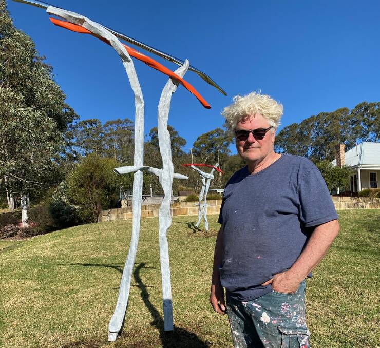 Gary Christian from Moss Vale with his Threshold pieces that are part of the Sculpture in the Valley exhibition. Picture by Glenn Ellard.