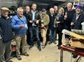 State Member for Kiama, and Shoalhaven Councillor Serena Copley, celebrate funding for tools with Kangaroo Valley Men's Shed members. Picture supplied.