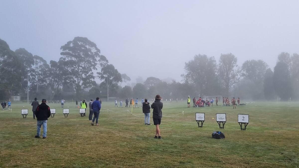 Players and parents gather ahead of a Saturday morning kick off at Stephens Park earlier this season. Picture Bowral FC