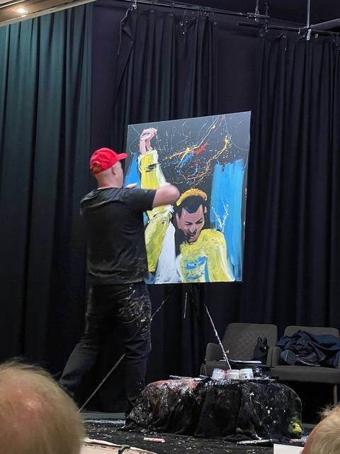 Speed painter Brad Blaze wowed the audience with his performance and masterful painting of three rock icons. Picture supplied.