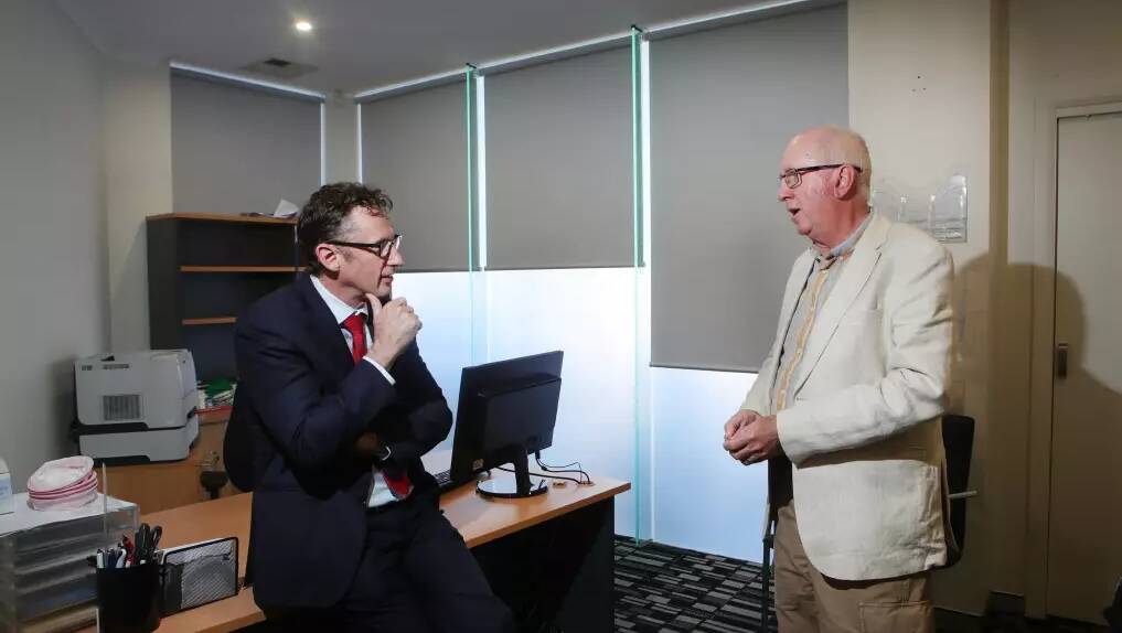 Stephen Jones with Dr Lawrence Noonan at the Dapto Medical Centre in late 2022, when Dapto became a Distribution Priority Area. Picture by Sylvia Liber.
