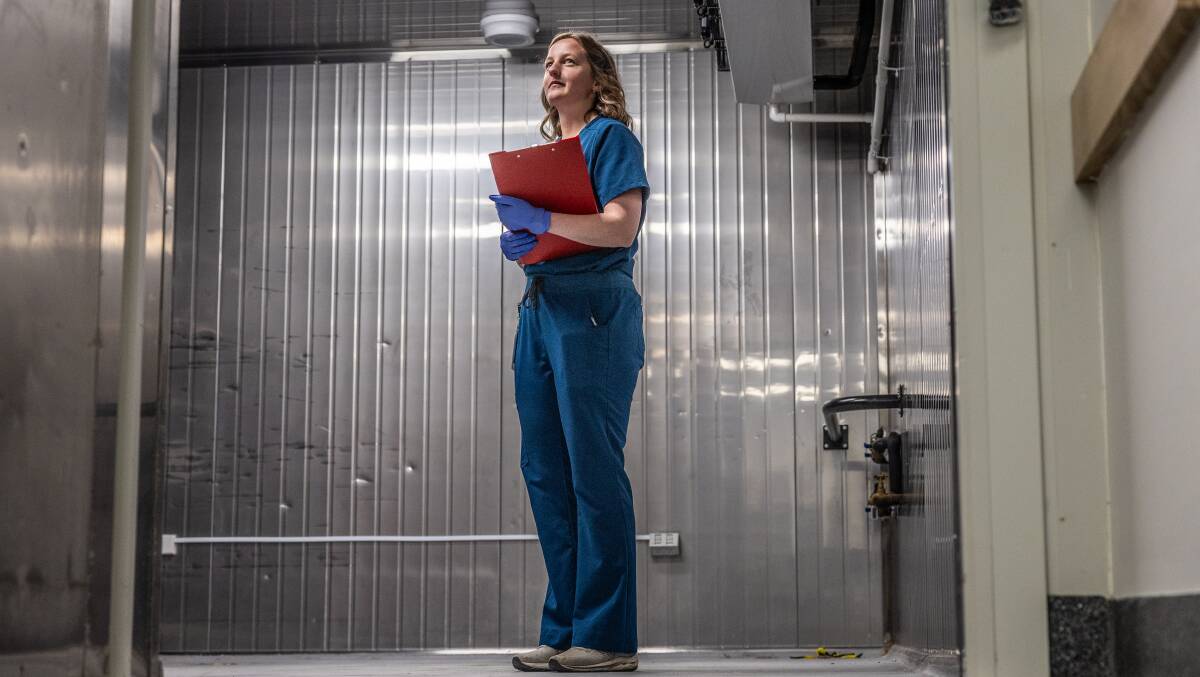 Mortuary assistant Belinda Brooker inside the cold storage. Picture by Gary Ramage
