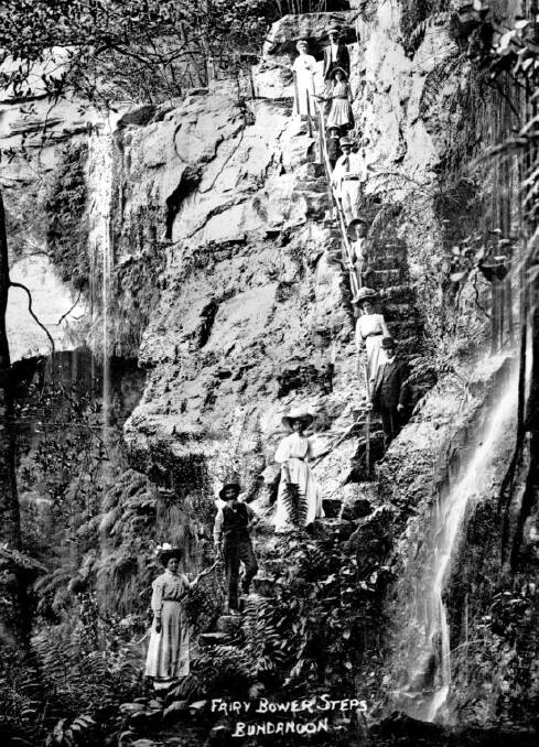 WATCH YOUR STEP: Descending to the base of Fairy Bower Falls in the Bundanoon Gullies, c1900. Photo: Bundanoon History Group.