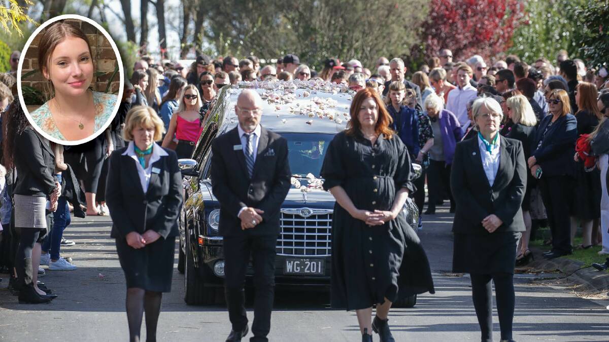 Mourners see off the hearse after Lily Van De Putte's funeral. Picture by Adam McLean.