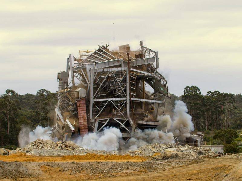 Alcoa's disused Anglesea power plant has been successfully demolished after a second attempt.