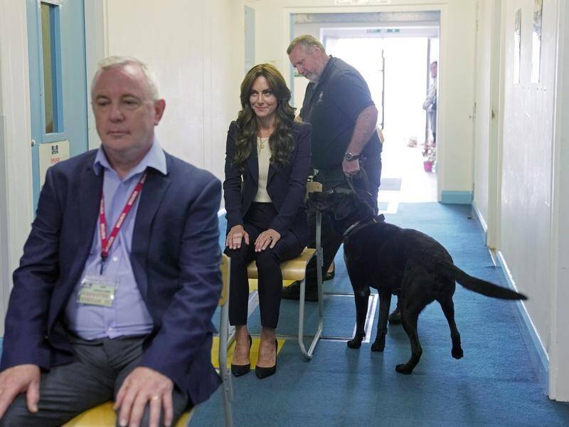 The Princess of Wales was sniffed by a drug detection dog at HMP High Down in England. (AP)