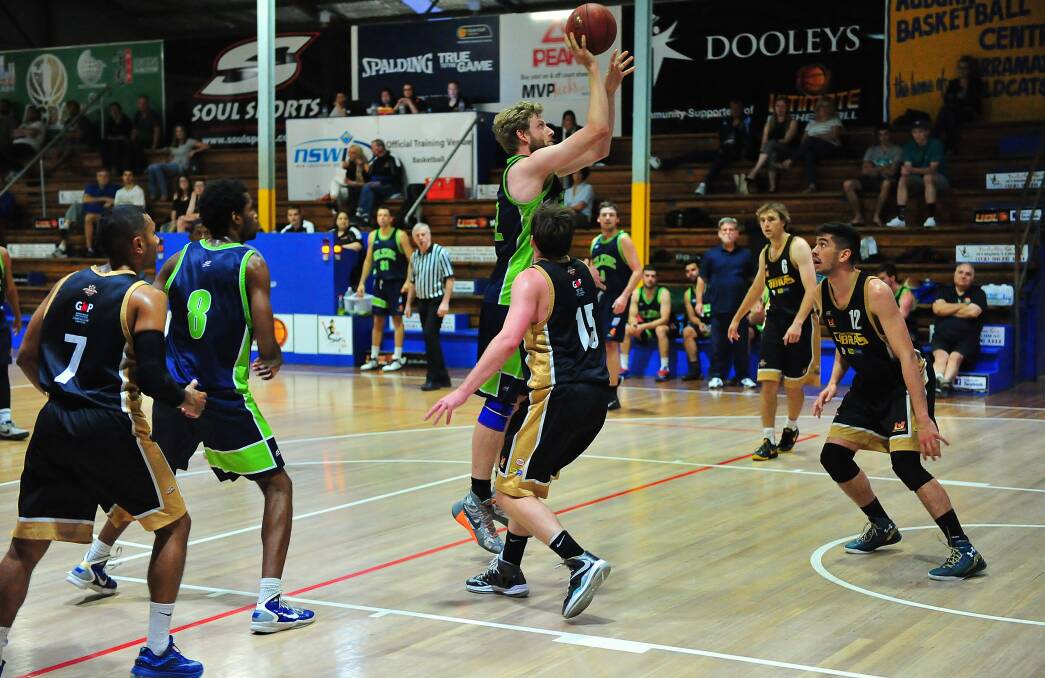 Andrew Storey in action during the 2015 Dooleys Ultimate Basketball League season. Photo courtesy of Noel Rowsell