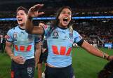 Blues' Jarome Luai (R) and Mitchell Moses are ecstatic after their State of Origin III victory. Photo: Dave Hunt/AAP PHOTOS