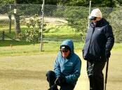 Golf Croquet Doubles: Malcolm Powys and Jill Sullivan consider their strategy. Picture supplied.