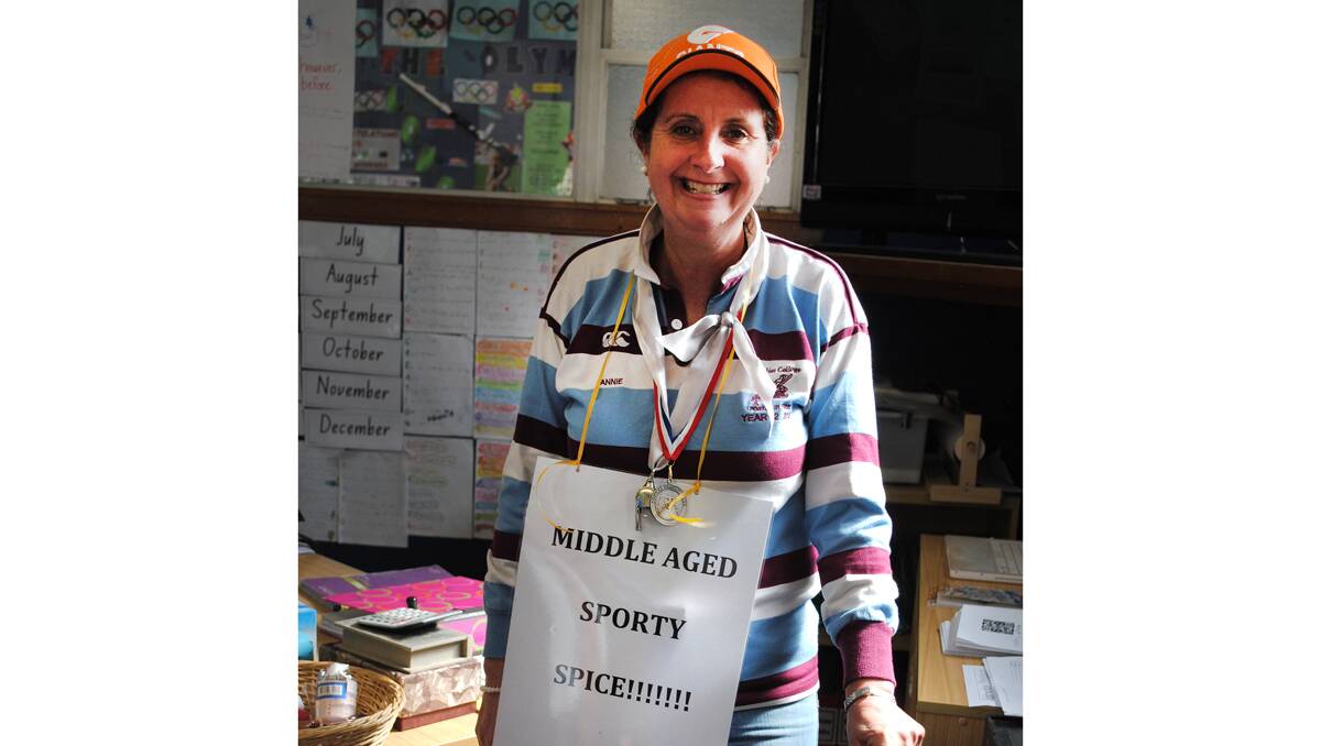 Year 2 teacher Sue Perkins happilly took on the champion theme for this year's book parade dressing up as Middle Aged Sporty Spice.  