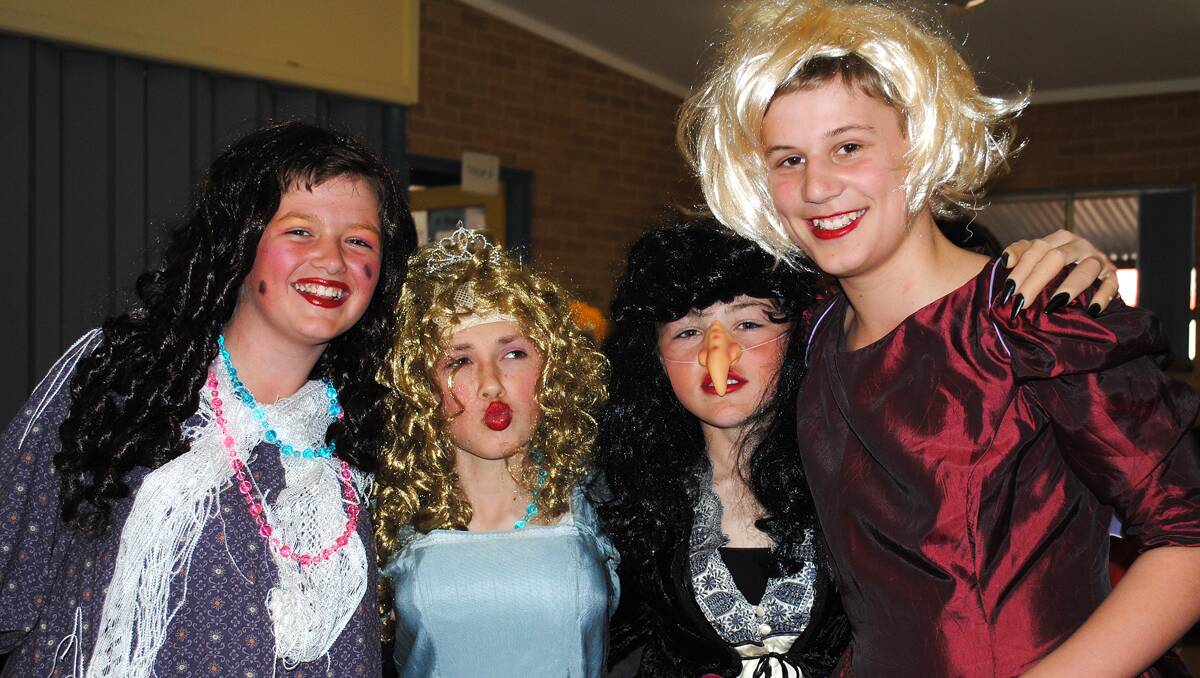 Year 6 studentsWill Andreas, Tim Malone, Will Bolte and Brandon Freire had no trouble taking on the role of the ugly step sisters, their mother and the fairy godmother.  