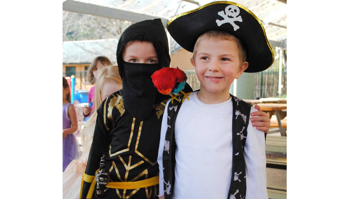 Enjoying their first school book parade are Ninja Jayden Moore and pirate Jordan Turner.  